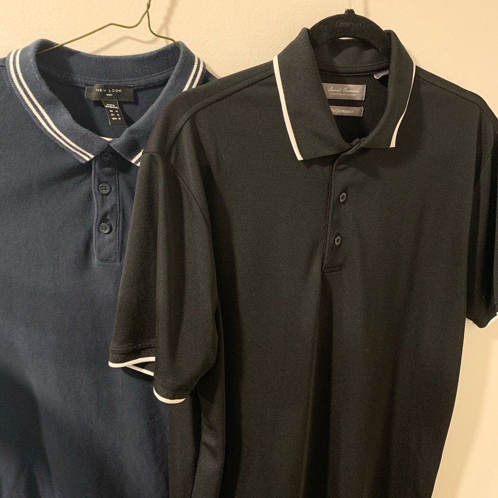 Bundle of two ringer polos. One in navy blue. One in black. Both medium.